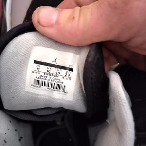 Black pair of Jordans